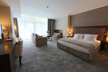 Фото номера Семейный номер Отель HAVET Hotel Resort &amp; Spa г. Дзвижино 2