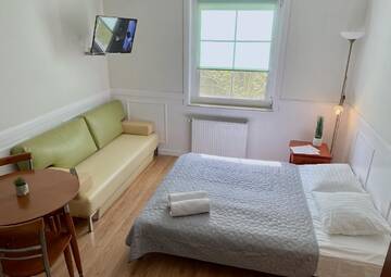 Фотографии Апартаменты Apartamenty i Pokoje Magnolia г. Дзвижино (Польша) №2 Фото Апартаменты Apartamenty i Pokoje Magnolia г. Дзвижино 2